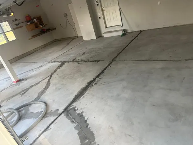 Garage Epoxy Floor on 7th St in Windsor, CO - before and after 1 — before
