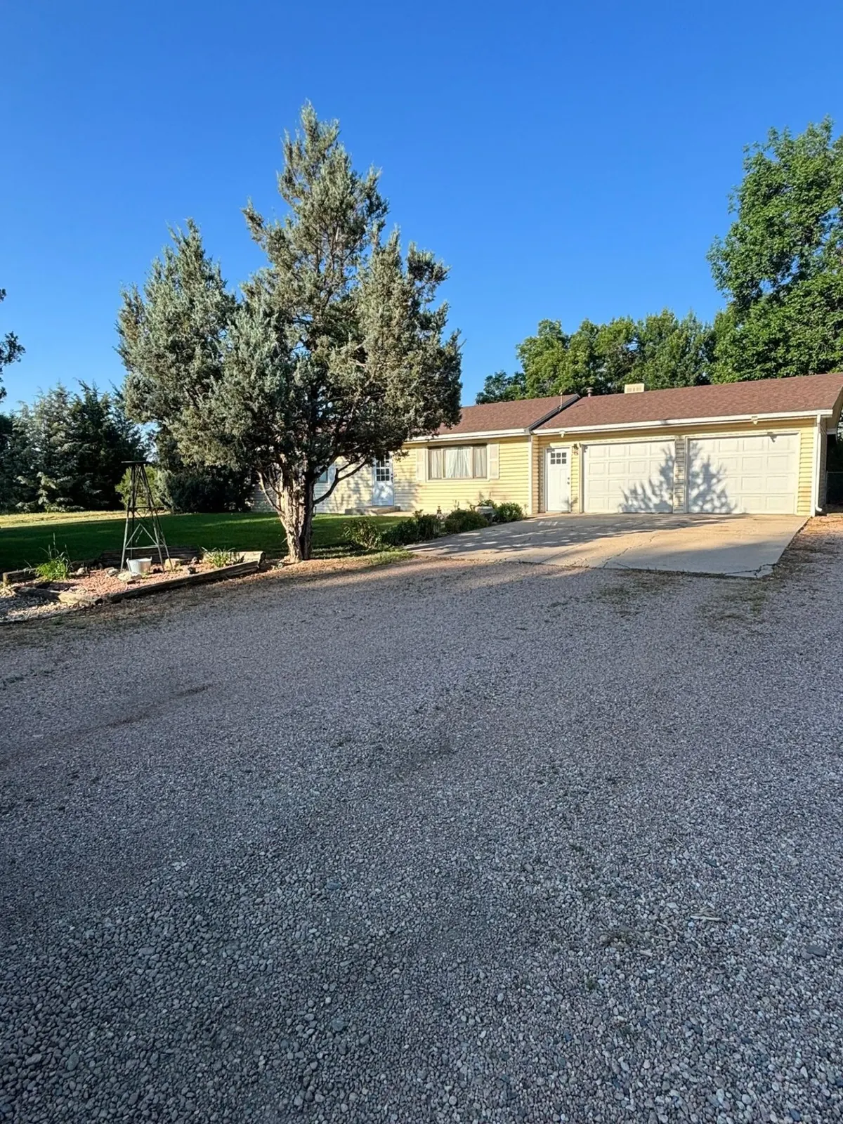 Driveway Replacement and Expansion on Round Butte Dr in Fort Collins, CO - before and after 1 — before