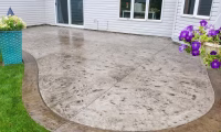 Stamped concrete patio and driveway installation in Northern Colorado.