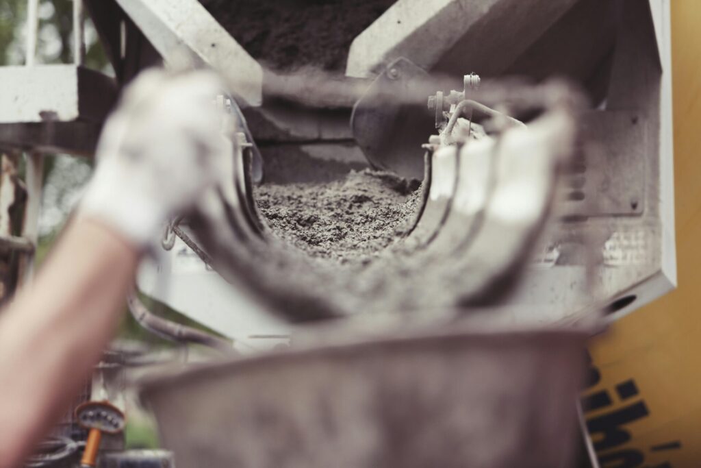 Concrete contractor pouring fresh concrete in Loveland, CO for a durable residential and commercial project.