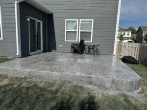Freshly installed stamped and colored concrete patio in Fort Collins, Colorado.