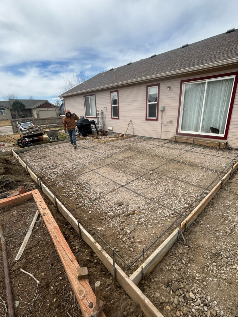 Before Stamped Colored Concrete Patio – Indian Village Dr, Wellington, CO
