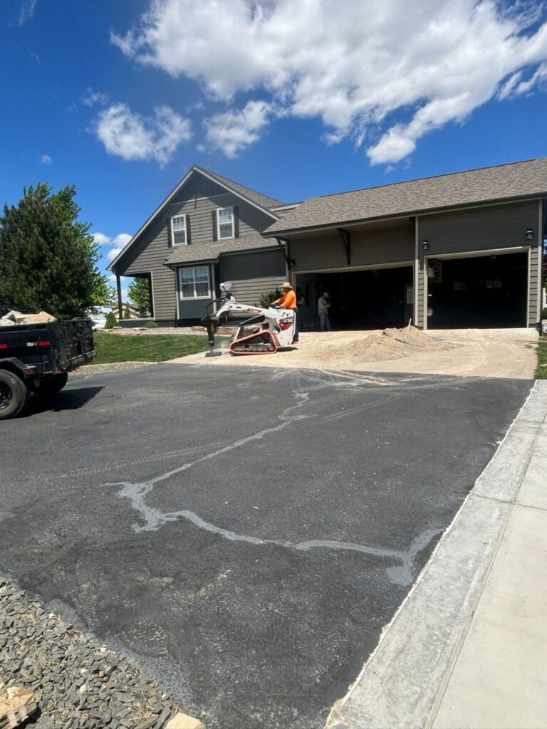 “Old driveway with steel mesh before replacement in Berthoud, CO”